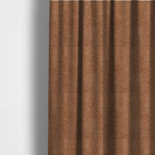 The fabric used to create these made-to-measure curtains features a high-pile faux fur texture that provides a rich, earthy aesthetic with a soft and plush tactile quality.