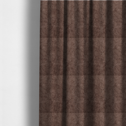 The fabric used to create these made-to-measure curtains features a high-pile faux fur texture that offers a deep, grounded aesthetic with a soft and plush tactile quality.