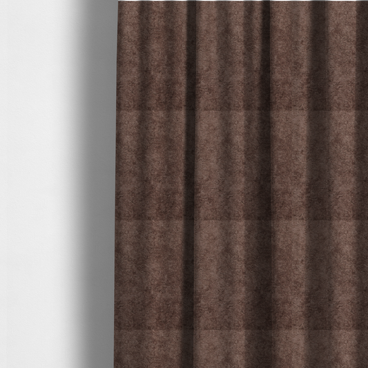 The fabric used to create these made-to-measure curtains features a high-pile faux fur texture that offers a deep, grounded aesthetic with a soft and plush tactile quality.
