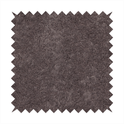 This fabric features a high-pile faux fur texture that offers a deep, moody aesthetic with a soft and plush tactile quality.