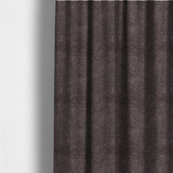 The fabric used to create these made-to-measure curtains features a high-pile faux fur texture that offers a deep, moody aesthetic with a soft and plush tactile quality.