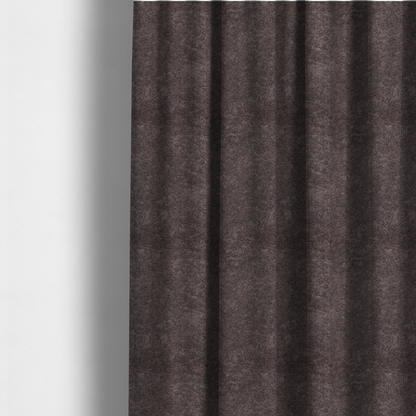 The fabric used to create these made-to-measure curtains features a high-pile faux fur texture that offers a deep, moody aesthetic with a soft and plush tactile quality.