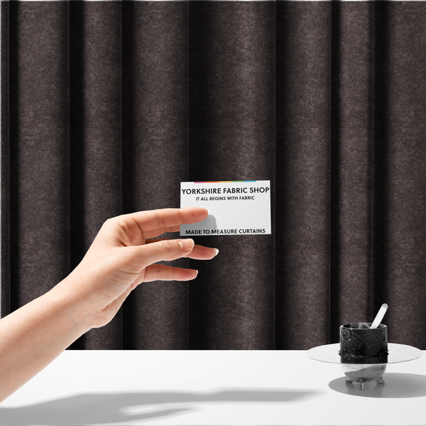 The fabric used to create these made-to-measure curtains features a high-pile faux fur texture that offers a deep, moody aesthetic with a soft and plush tactile quality.