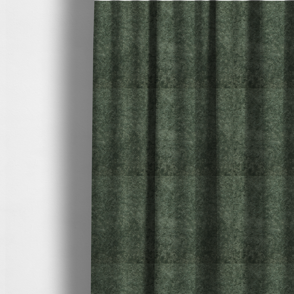 The fabric used to create this made-to-measure curtains is a soft, textured fabric in a rich, earthy green shade. The surface features a dense, uniform, and plush pile, characteristic of thick fleece or absorbent terry cloth material.