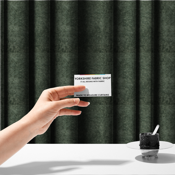 The fabric used to create this made-to-measure curtains is a soft, textured fabric in a rich, earthy green shade. The surface features a dense, uniform, and plush pile, characteristic of thick fleece or absorbent terry cloth material.