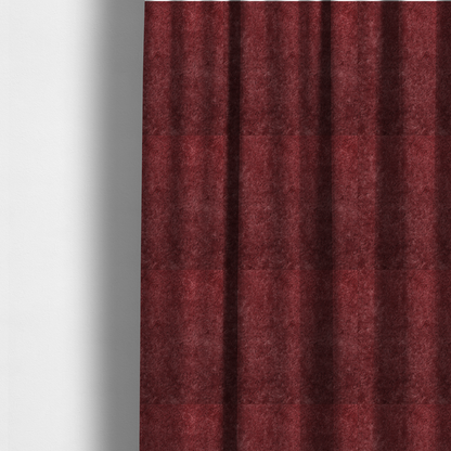 The fabric used to create these made-to-measure curtains is a plush, deep burgundy fabric featuring a dense, uniform, and textured pile.