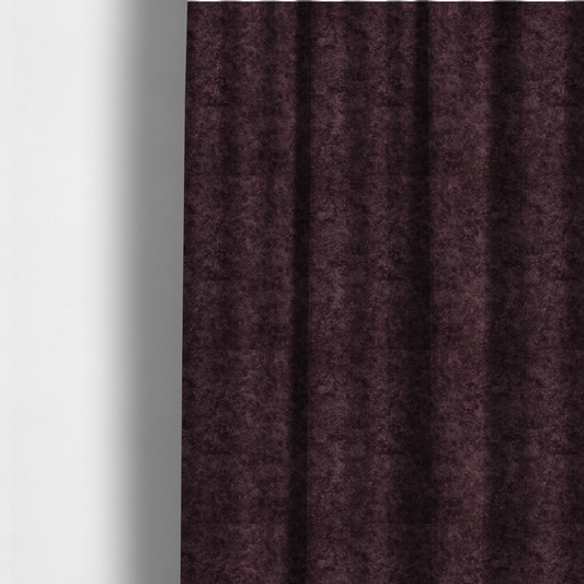 The fabric used to create these made-to-measure curtains is a plush, deep plum fabric featuring a dense, uniform, and textured pile.