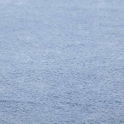 A soft, light blue fabric with a dense, uniform, and plush pile.