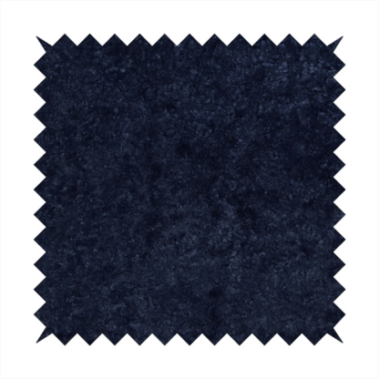 A soft, navy blue fabric featuring a dense, uniform, plush pile like thick fleece.