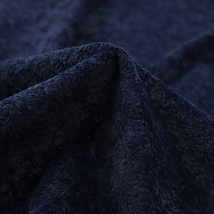 A soft, navy blue fabric featuring a dense, uniform, plush pile like thick fleece.