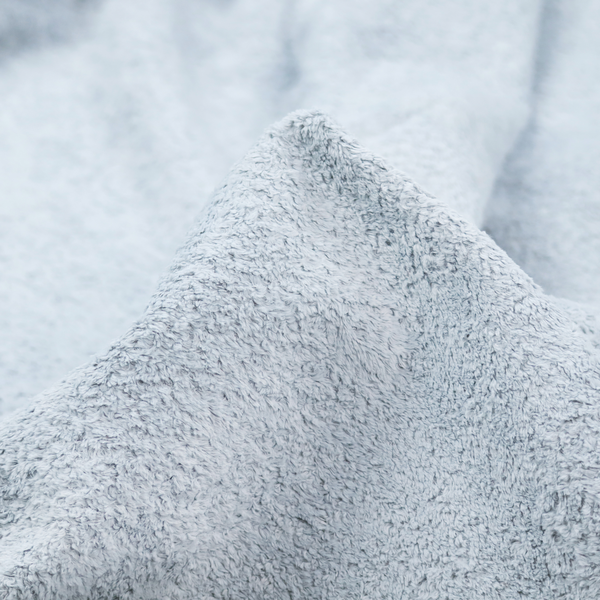 A soft, pale blue fabric with a dense, uniform, and plush pile.