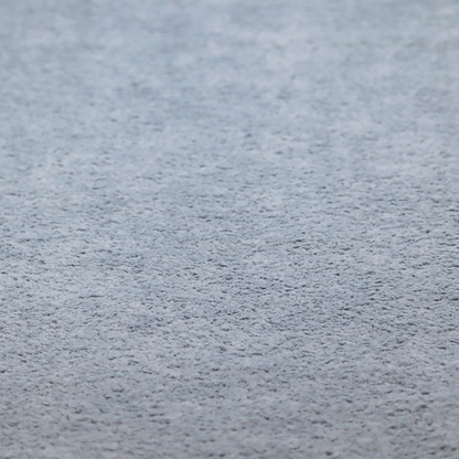 A soft greyish-blue fabric with a dense, uniform, textured pile like thick fleece.