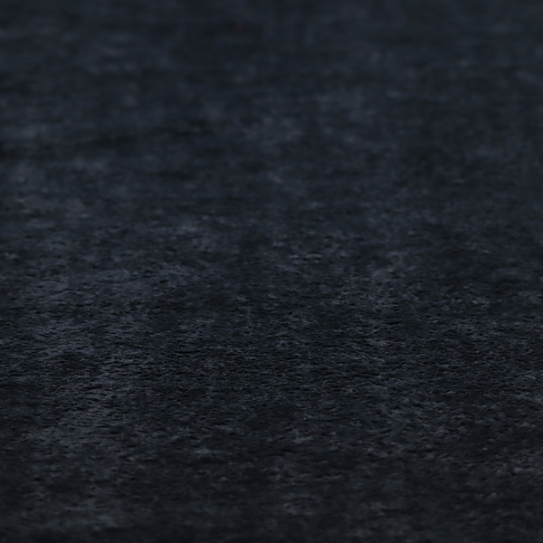 A plush charcoal fabric with a dense, uniform, textured pile like thick fleece.