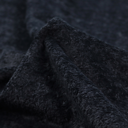A plush charcoal fabric with a dense, uniform, textured pile like thick fleece.