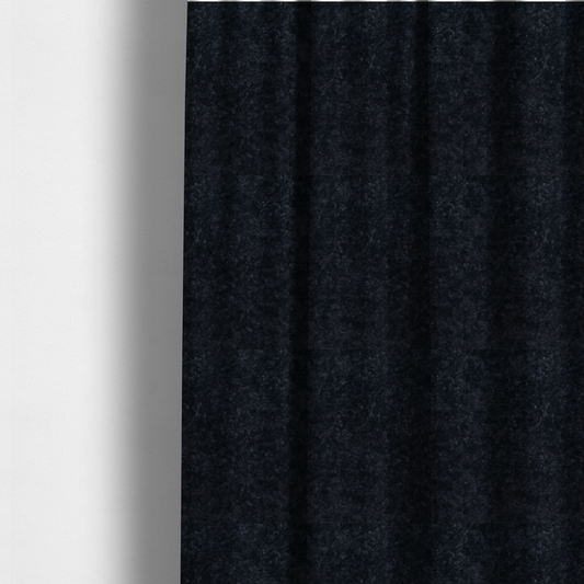 The fabric used to create these made-to-measure curtains is a plush charcoal fabric with a dense, uniform, textured pile like thick fleece.