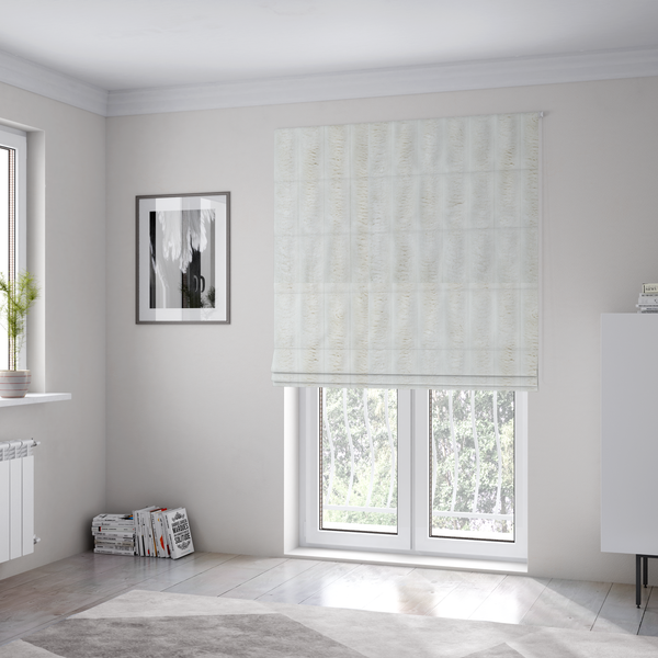 The fabric used to create these Roman blinds is a cream-coloured textile featuring a repeating, vertical ribbed pattern. The fabric alternates between wide, soft, faux-fur-like plush bands and narrow, smooth, flat channels.
