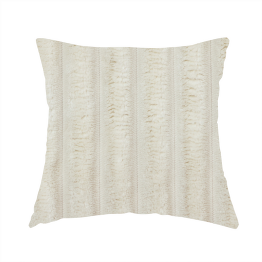The fabric used to create this handmade cushion is a detailed view of a light beige or cream-coloured textile featuring a repeating, vertical channel-tufted pattern. The material alternates between soft, high-pile plush bands and thin, compressed vertical lines.