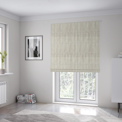 The fabric used to create these Roman blinds is a detailed view of a light beige or cream-coloured textile featuring a repeating, vertical channel-tufted pattern. The material alternates between soft, high-pile plush bands and thin, compressed vertical lines.