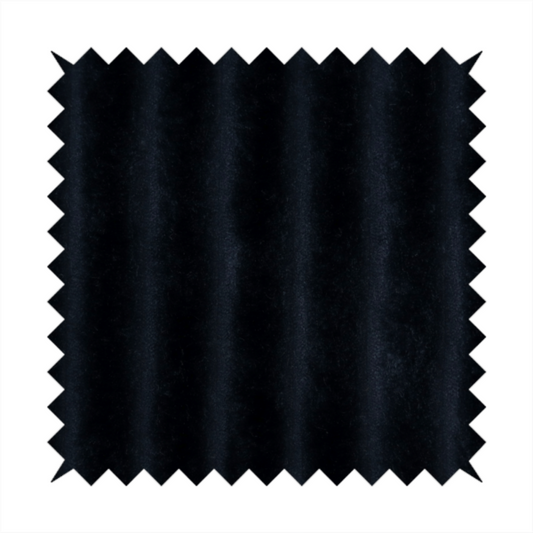 A deep black textile featuring a repeating, vertical channel-tufted pattern. The fabric alternates between thick, high-pile plush bands and thin, compressed vertical channels.