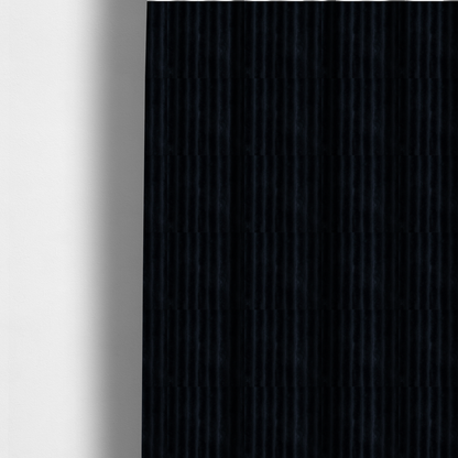 The fabric used to create these made-to-measure curtains is a deep black textile featuring a repeating, vertical channel-tufted pattern. The fabric alternates between thick, high-pile plush bands and thin, compressed vertical channels.