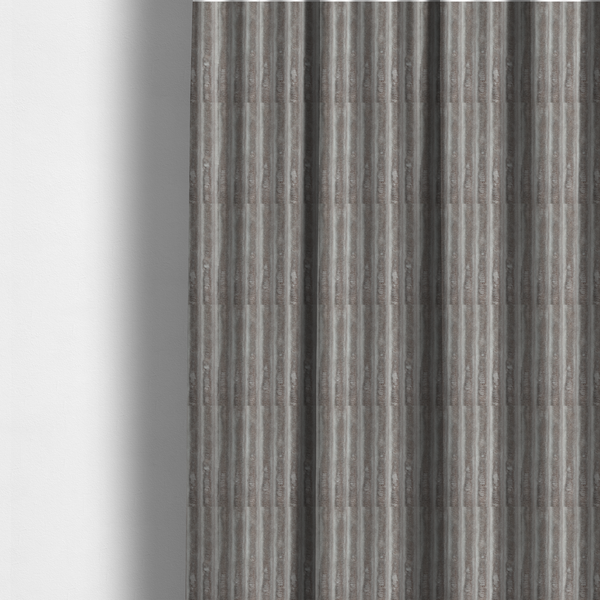 The fabric used to create these made-to-measure curtains is a grey textile featuring a repeating, vertical channel-tufted pattern that alternates between soft, high-pile bands and narrow, flat lines.