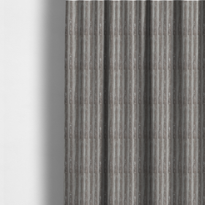 The fabric used to create these made-to-measure curtains is a grey textile featuring a repeating, vertical channel-tufted pattern that alternates between soft, high-pile bands and narrow, flat lines.
