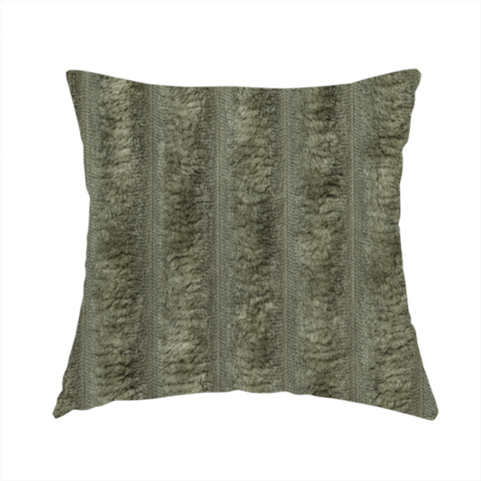 The fabric used to create this handmade cushion is a muted, olive green textile featuring a repeating, vertical channel-tufted pattern that alternates between soft, high-pile bands and narrow, flat lines.