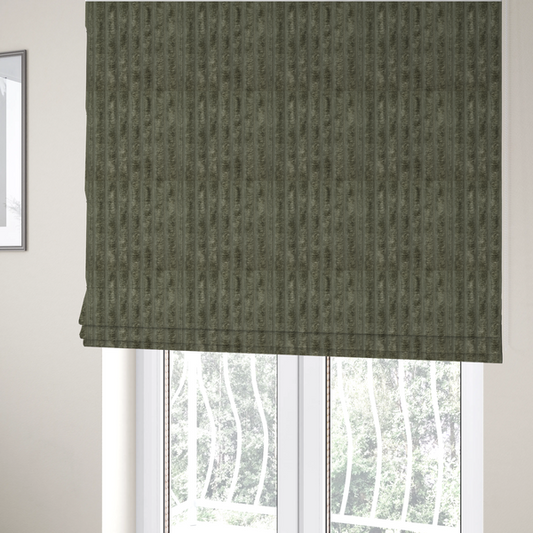 The fabric used to create these Roman blinds is a muted, olive green textile featuring a repeating, vertical channel-tufted pattern that alternates between soft, high-pile bands and narrow, flat lines.