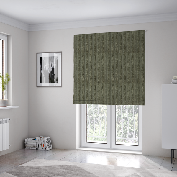 The fabric used to create these Roman blinds is a muted, olive green textile featuring a repeating, vertical channel-tufted pattern that alternates between soft, high-pile bands and narrow, flat lines.
