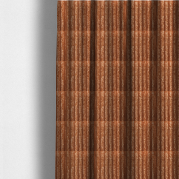 The fabric used to create these made-to-measure curtains is a tanned copper, vertically ribbed, channel-tufted plush fabric.