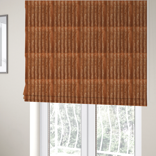The fabric used to create these Roman blinds is a  tanned copper, vertically ribbed, channel-tufted plush fabric.