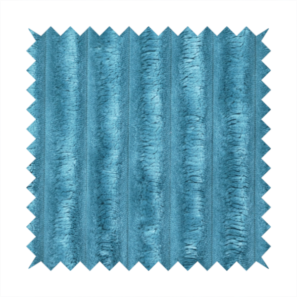 The fabric is a saturated, cool-toned teal or turquoise blue.