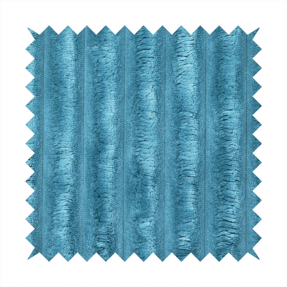 The fabric is a saturated, cool-toned teal or turquoise blue.