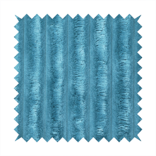 The fabric is a saturated, cool-toned teal or turquoise blue.