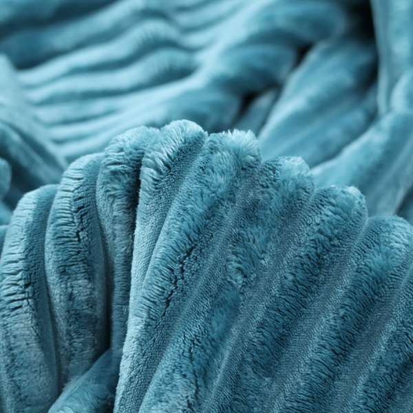 The fabric is a saturated, cool-toned teal or turquoise blue.