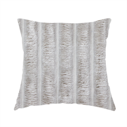 The fabric used to create this handmade cushion is a silver vertically ribbed, channel-tufted plush fabric.
