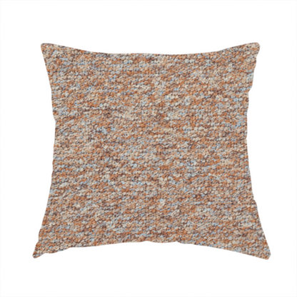 The fabric used to create this handmade cushion is a terracotta, and soft blue-grey textured upholstery fabric with a durable finish.