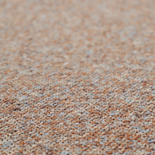 A terracotta, and soft blue-grey textured upholstery fabric with a durable finish.