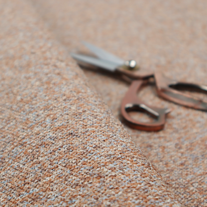 A terracotta, and soft blue-grey textured upholstery fabric with a durable finish.