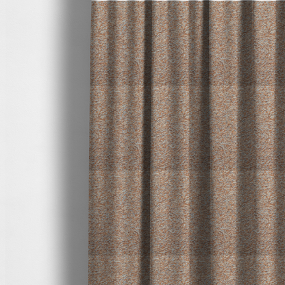 The fabric used to create these made-to-measure curtains is a terracotta, and soft blue-grey textured upholstery fabric with a durable finish.