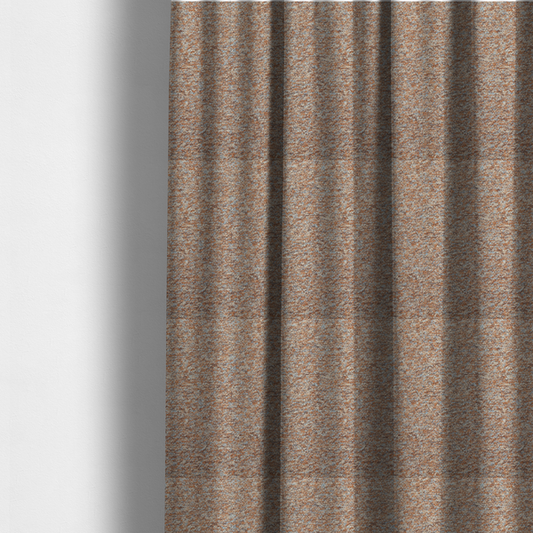 The fabric used to create these made-to-measure curtains is a terracotta, and soft blue-grey textured upholstery fabric with a durable finish.