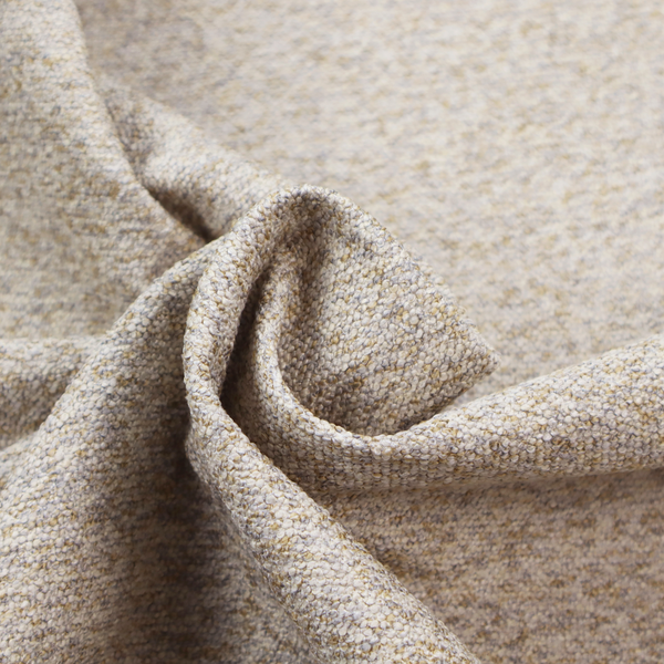 A cream, light grey, and subtle mustard yellow textured upholstery fabric.