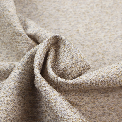 A cream, light grey, and subtle mustard yellow textured upholstery fabric.