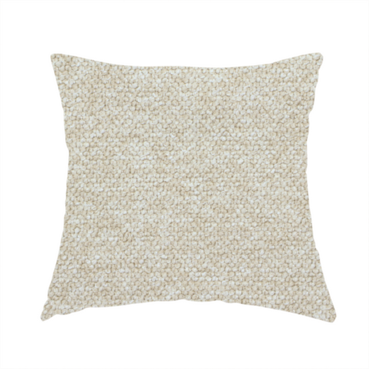 The fabric used to create this handmade cushion is a creamy off-white textured upholstery fabric with a consistent, neutral weave.
