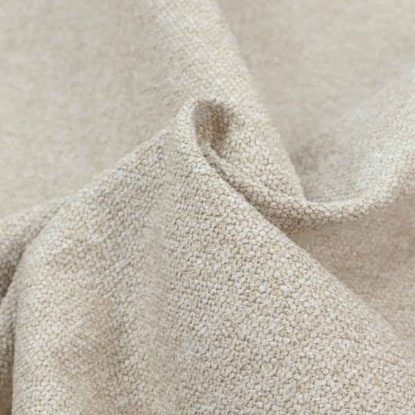 A creamy off-white textured upholstery fabric with a consistent, neutral weave.