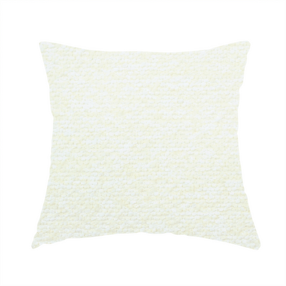 The fabric used to create this handmade cushion is a bright off-white textured upholstery fabric with a clean, light weave.