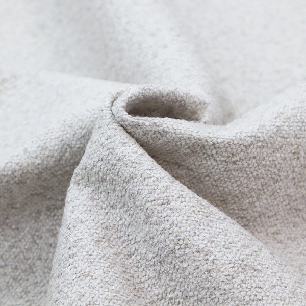 A light cool-toned grey and white blend textured upholstery fabric.