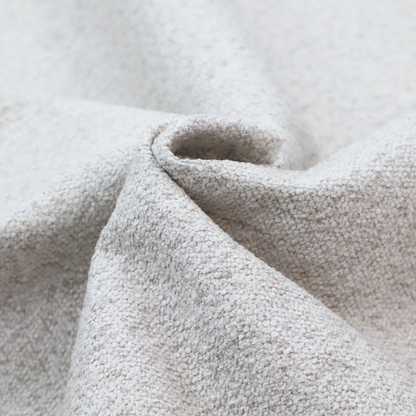 A light cool-toned grey and white blend textured upholstery fabric.