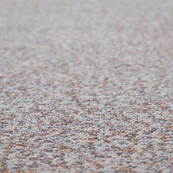 A muted blue-grey and earthy terracotta mixed textured upholstery fabric.