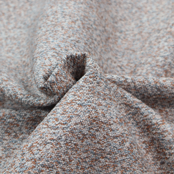 A muted blue-grey and earthy terracotta mixed textured upholstery fabric.